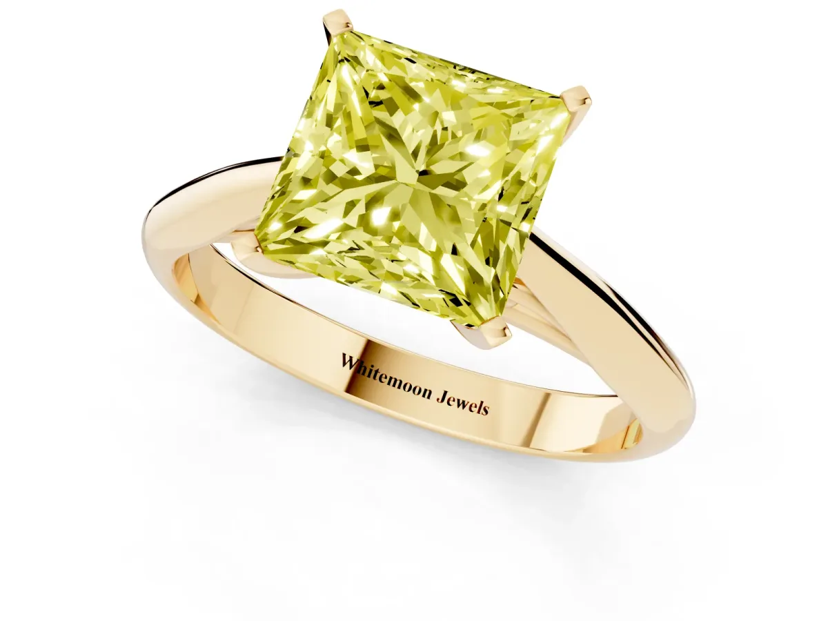 Fancy Yellow Princess Cut Diamond Solitaire Engagement Ring with Cathedral Setting and Four-Prong Mount Yellow gold