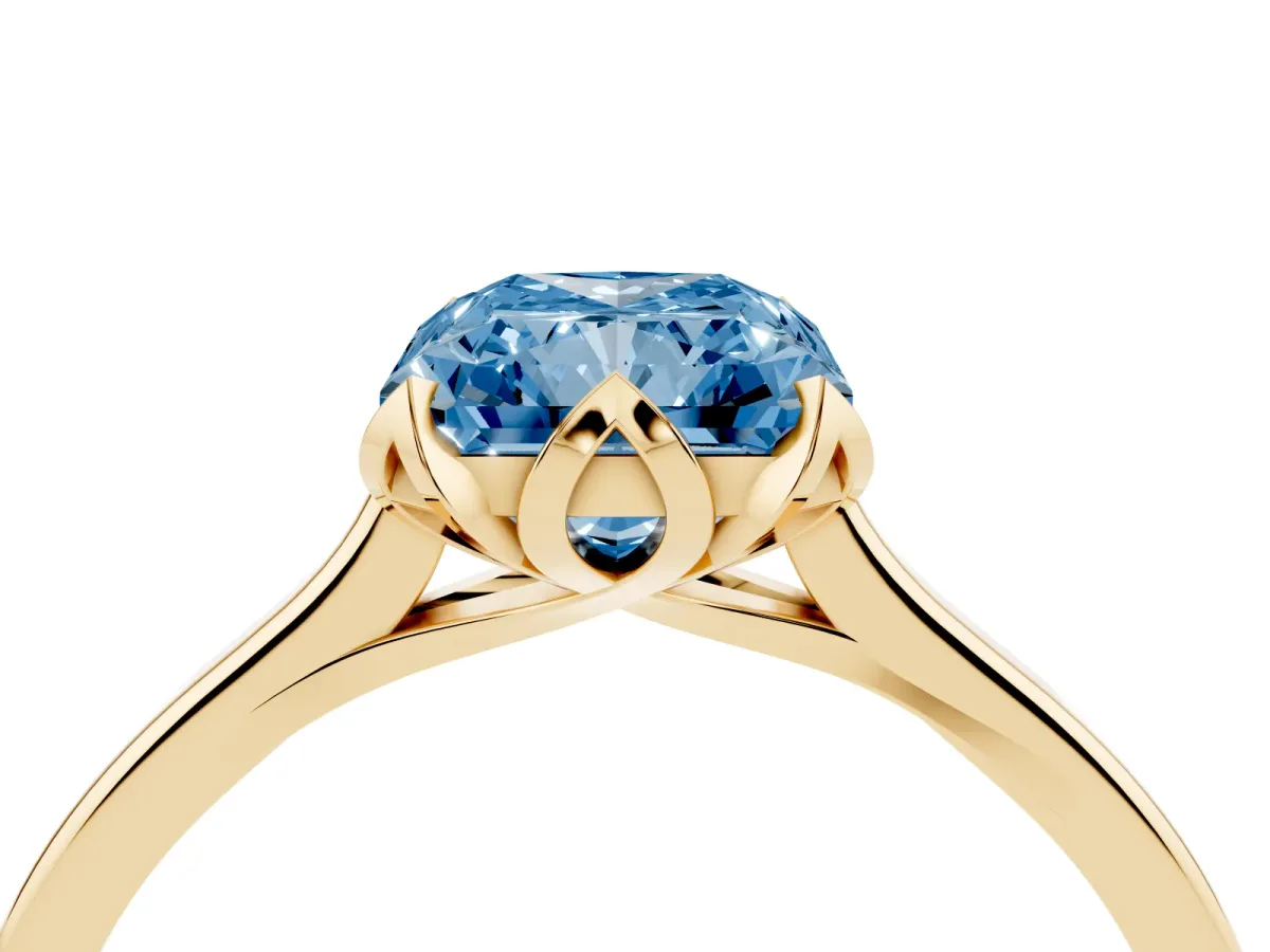 Fancy Blue Radiant Cut Diamond Solitaire Ring with Flower Prong Setting and Classic Band Yellow gold