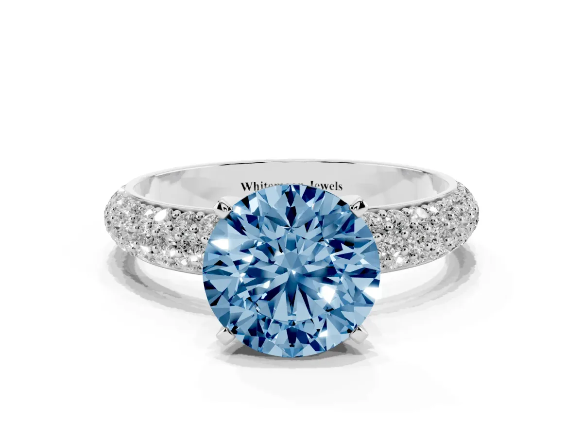 Fancy Blue Round Cut Diamond Solitaire Ring with Prong Setting and Pavé Band Platinum