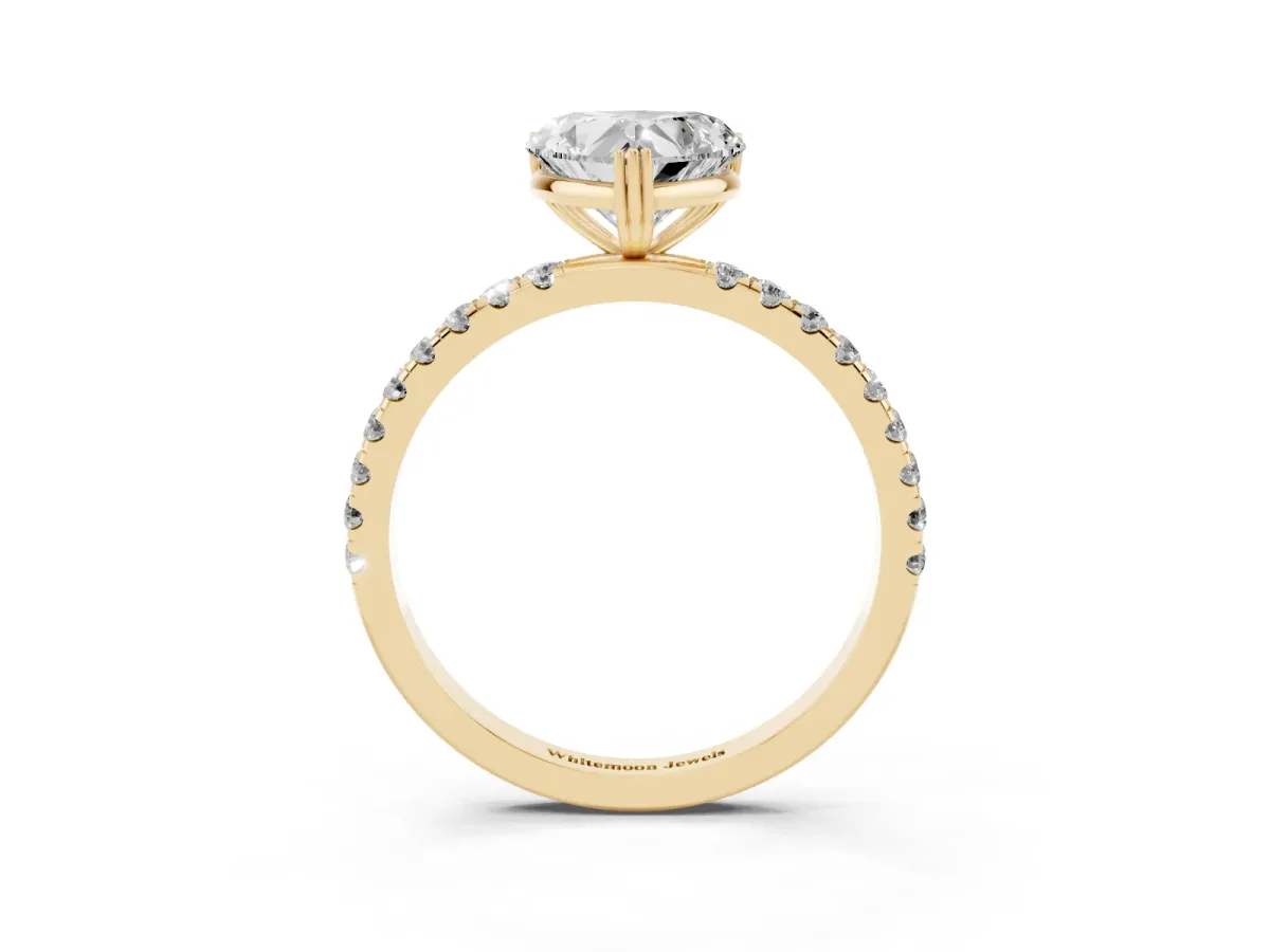Heart Cut Brilliant Solitaire with Pavé Band and Claw Prong Setting Yellow gold