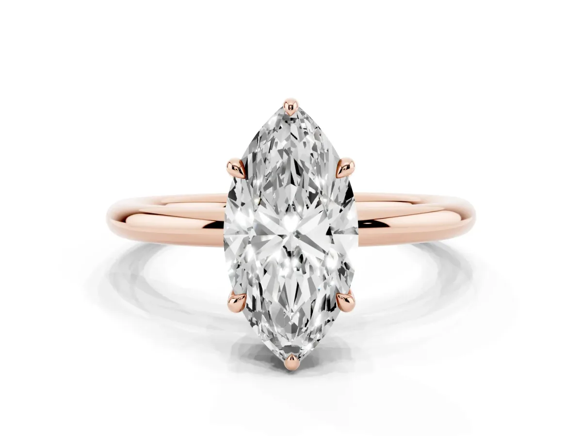 Marquise Cut Diamond Solitaire Ring with Thin Band and Four-Prong Setting Rose gold