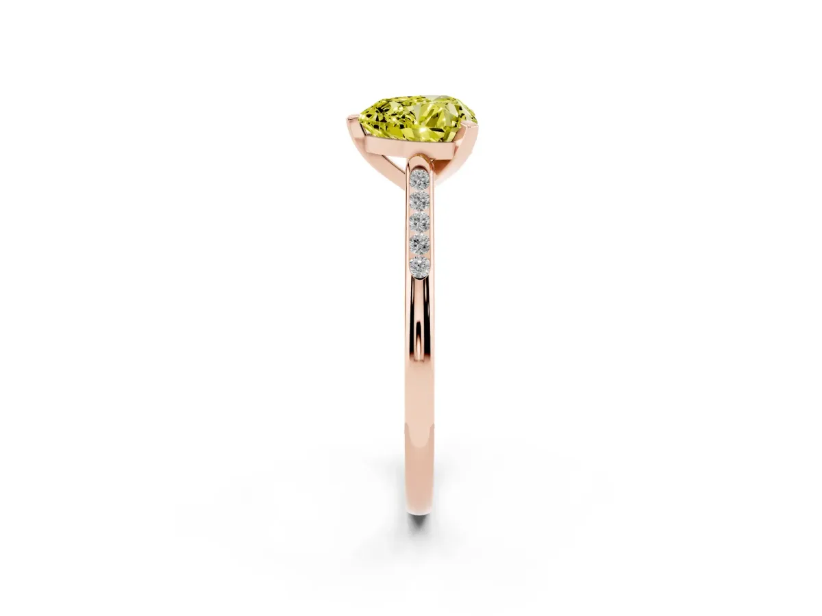 Fancy Yellow Heart Cut Diamond Solitaire Ring with Channel Set Round Band and Prong Setting Rose gold
