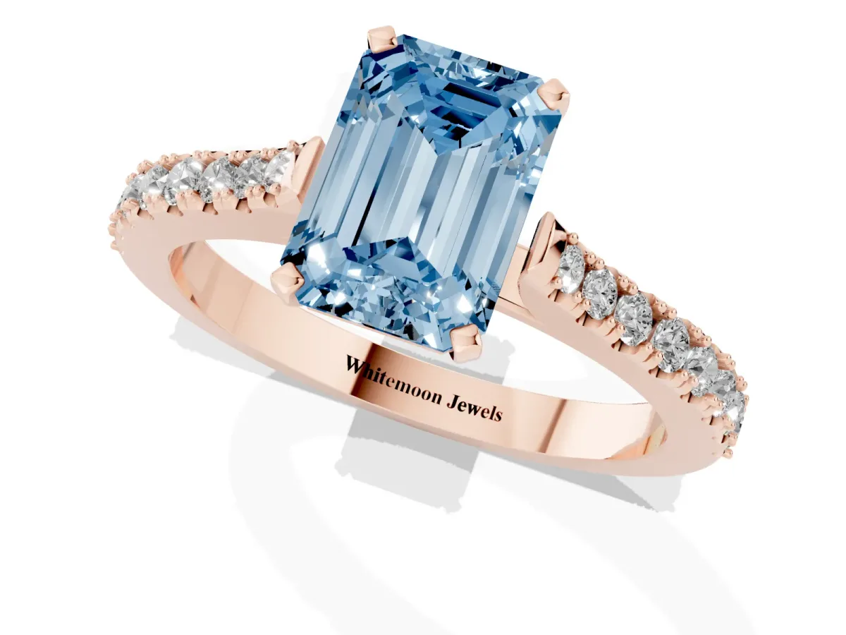 Fancy Blue Emerald Cut Cut Solitaire Diamond Engagement Ring with Pave Band and Four-Prong Setting Rose gold