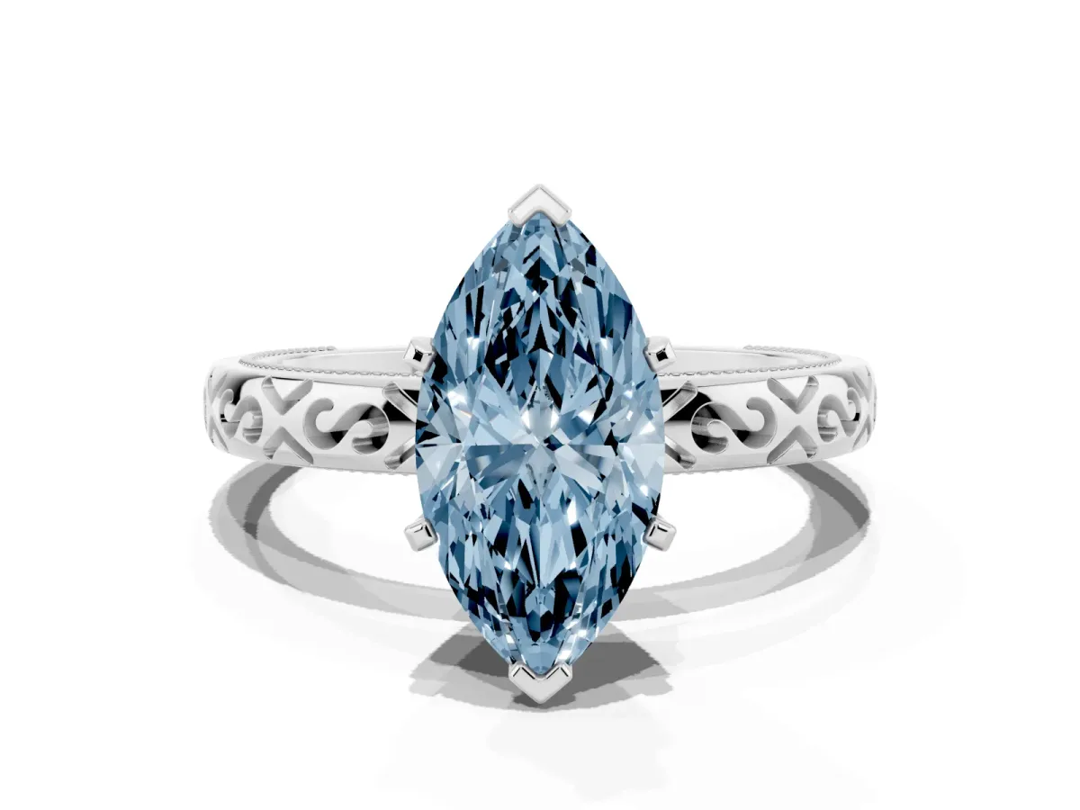 Fancy Blue Marquise Cut Solitaire Engagement Ring with Scrollwork Band and Four-Prong Setting Silver