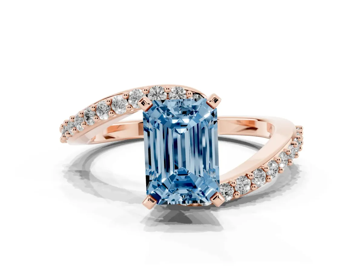 Fancy Blue Emerald Cut Solitaire Twist Band with Pave Set Diamonds and Four-Prong Setting Rose gold