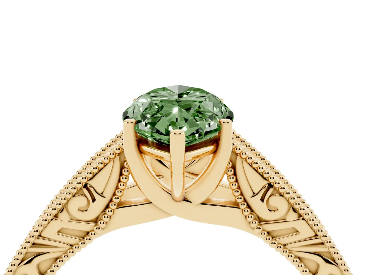 Fancy Green Marquise Cut Diamond Solitaire Ring with Engraved Band and Four-Prong Setting Yellow gold