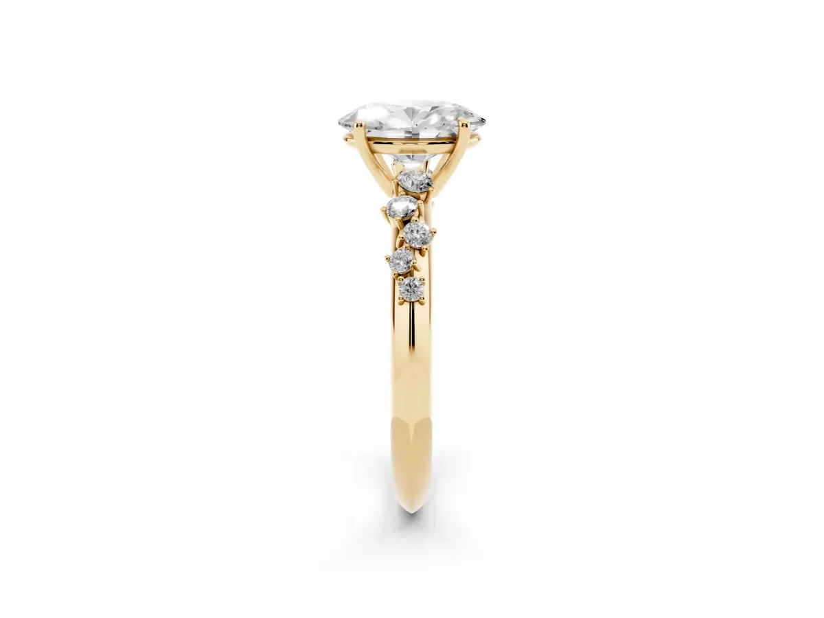 Oval Cut Diamond Cluster Side Stone Solitaire Ring with Prong Setting Yellow gold