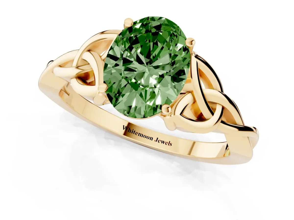 Fancy Green Oval Cut Diamond Solitaire Engagement Ring with Celtic Knot Band and Four-Prong Setting Yellow gold