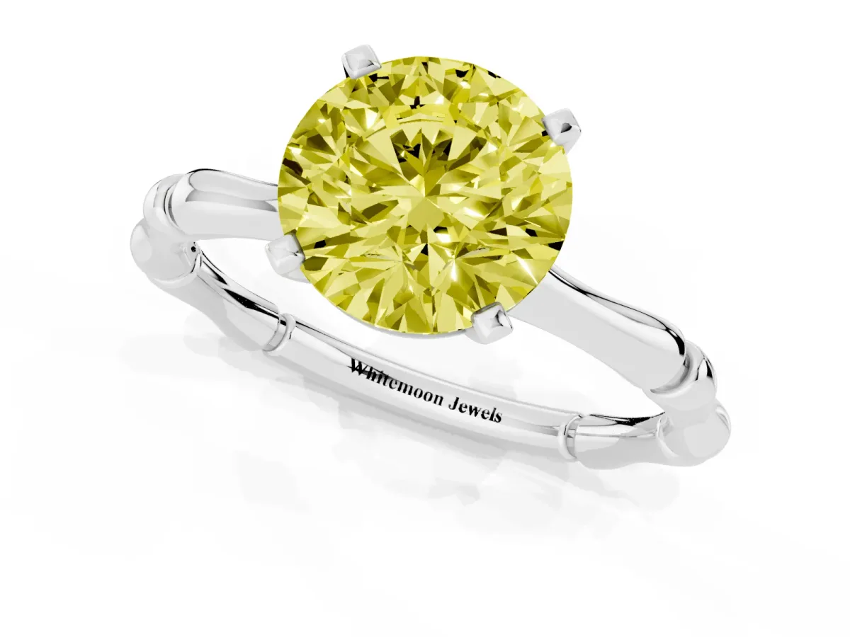 Fancy Yellow Round Cut Solitaire Diamond Ring with Bamboo Band and Four-Prong Setting Silver
