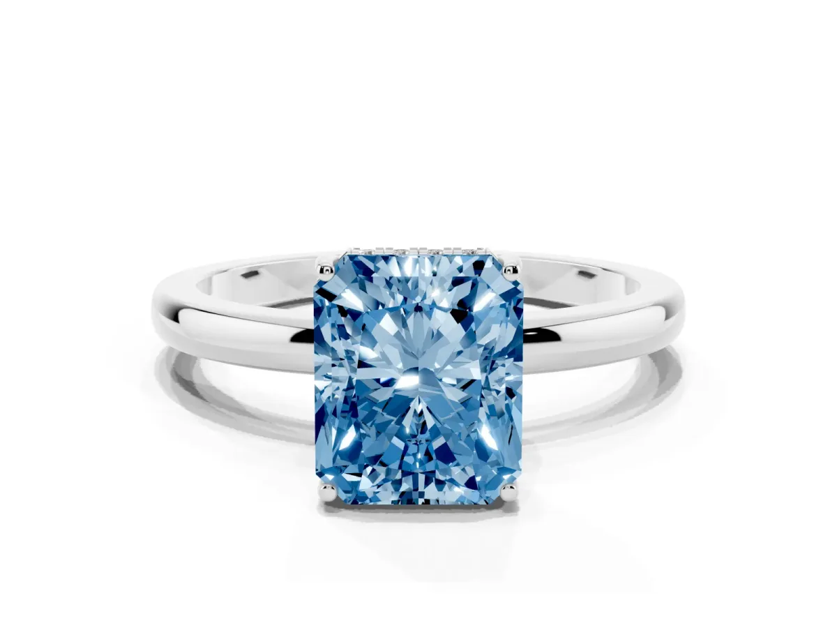 Fancy Blue Radiant Cut Solitaire Diamond Ring with Prong Setting and Plain Band Platinum