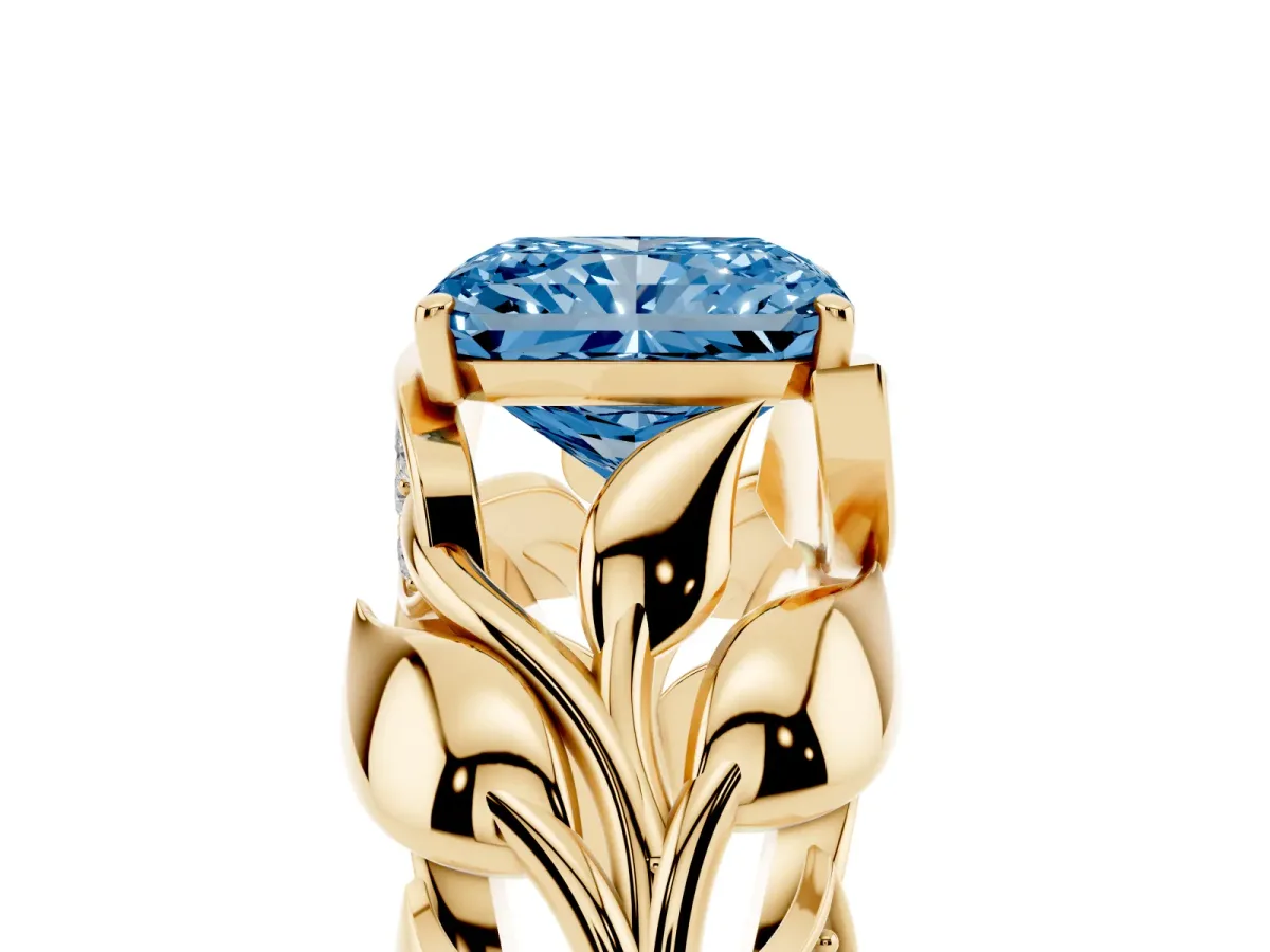 Fancy Blue Radiant Cut Diamond Leaf-Inspired Engagement Ring with Round Accents and Prong Setting Yellow gold