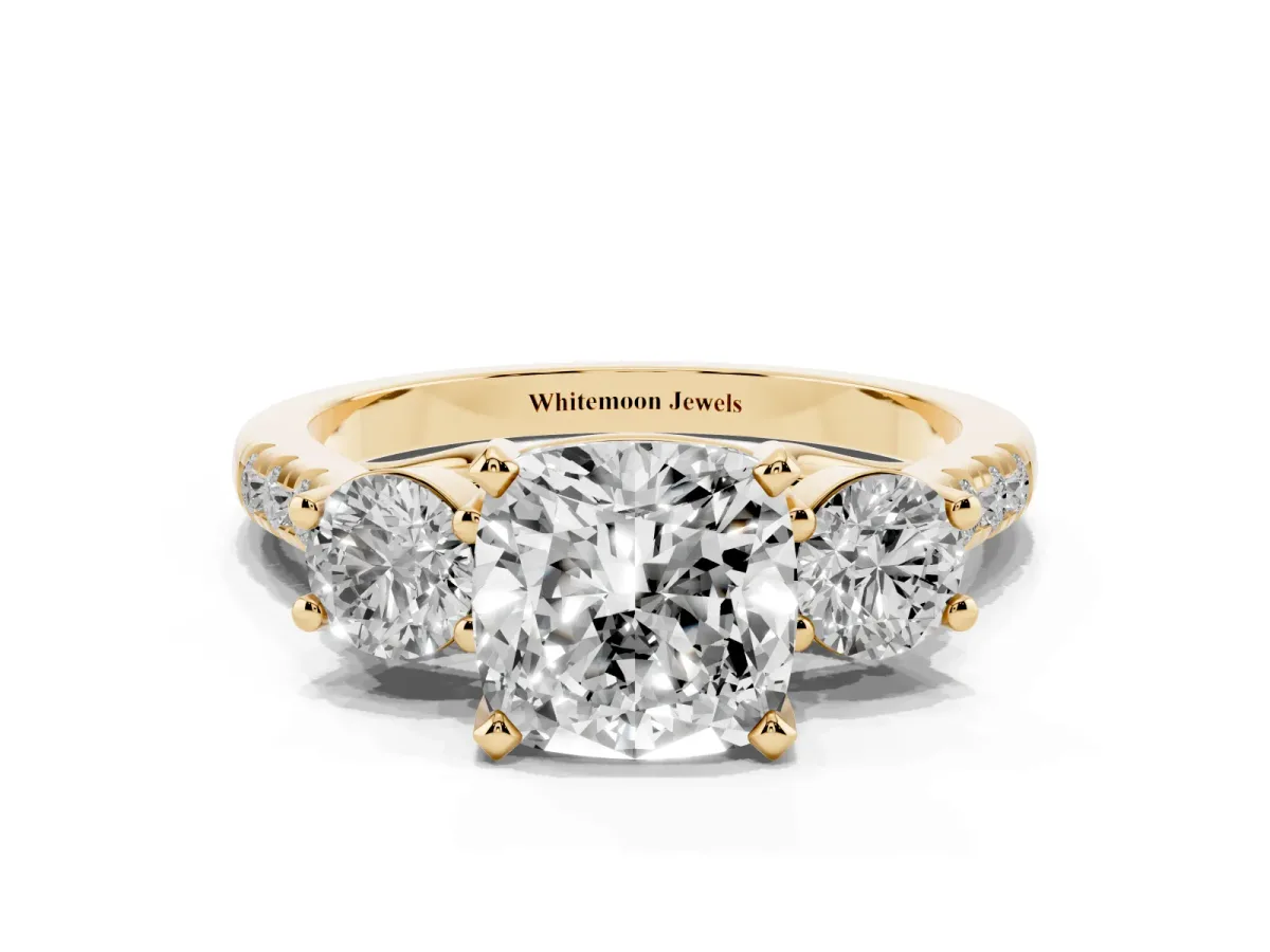 Three-Stone Cushion Cut Diamond Pavé Band with Four-Prong Setting Yellow gold