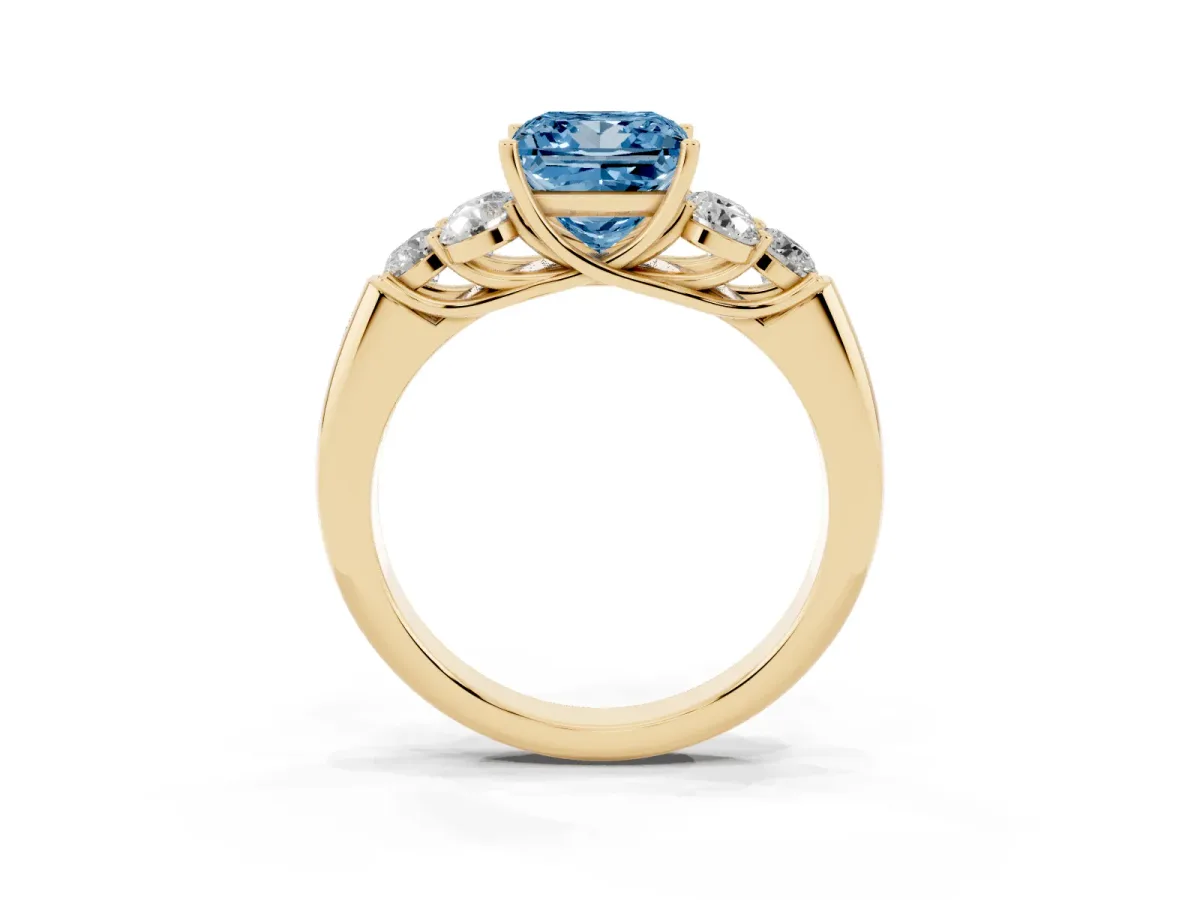 Fancy Blue Princess Cut Cut Diamond Cluster Ring with Round Accent Stones and Prong Setting on a Classic Band Yellow gold