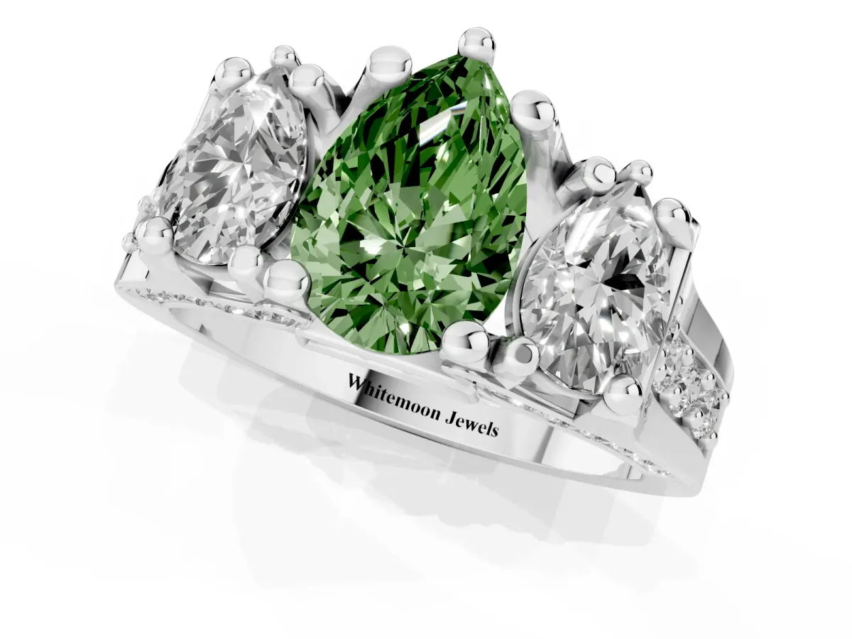 Fancy Green Pear Cut Diamond Three-Stone Ring with Channel Set Band and Four-Prong Setting Silver