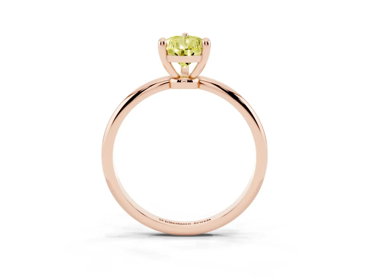 Fancy Yellow Pear Cut Solitaire Diamond Ring with 4-Prong Setting on a Classic Band Rose gold