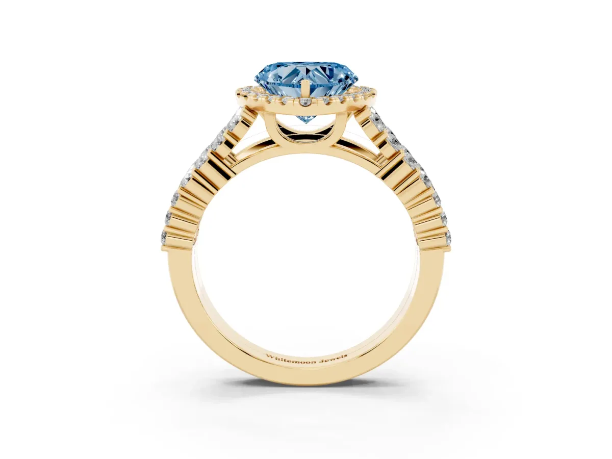Fancy Blue Heart Cut Diamond Halo Engagement Ring with Triple Row Round Pavé Band and Prong Setting Yellow gold