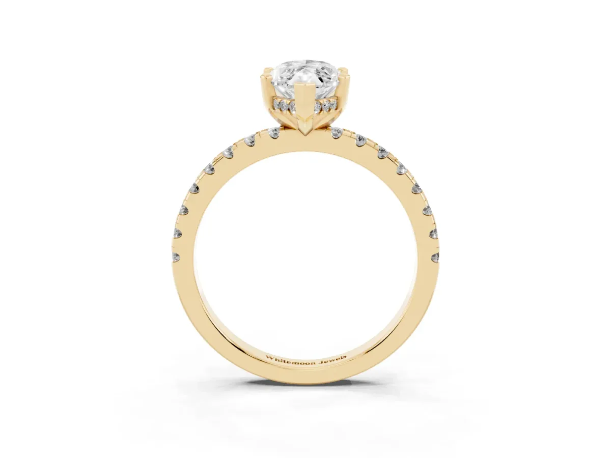 Marquise Cut Diamond Solitaire Ring with Round Pavé Band and Four-Prong Setting Yellow gold