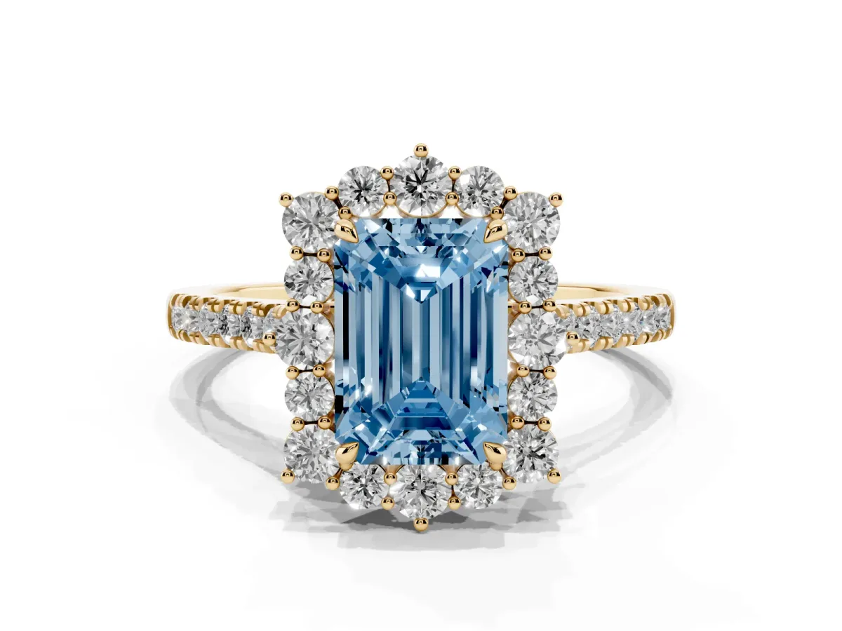 Fancy Blue Emerald Cut Halo Diamond Ring with Pavé Band and Prong Setting Yellow gold