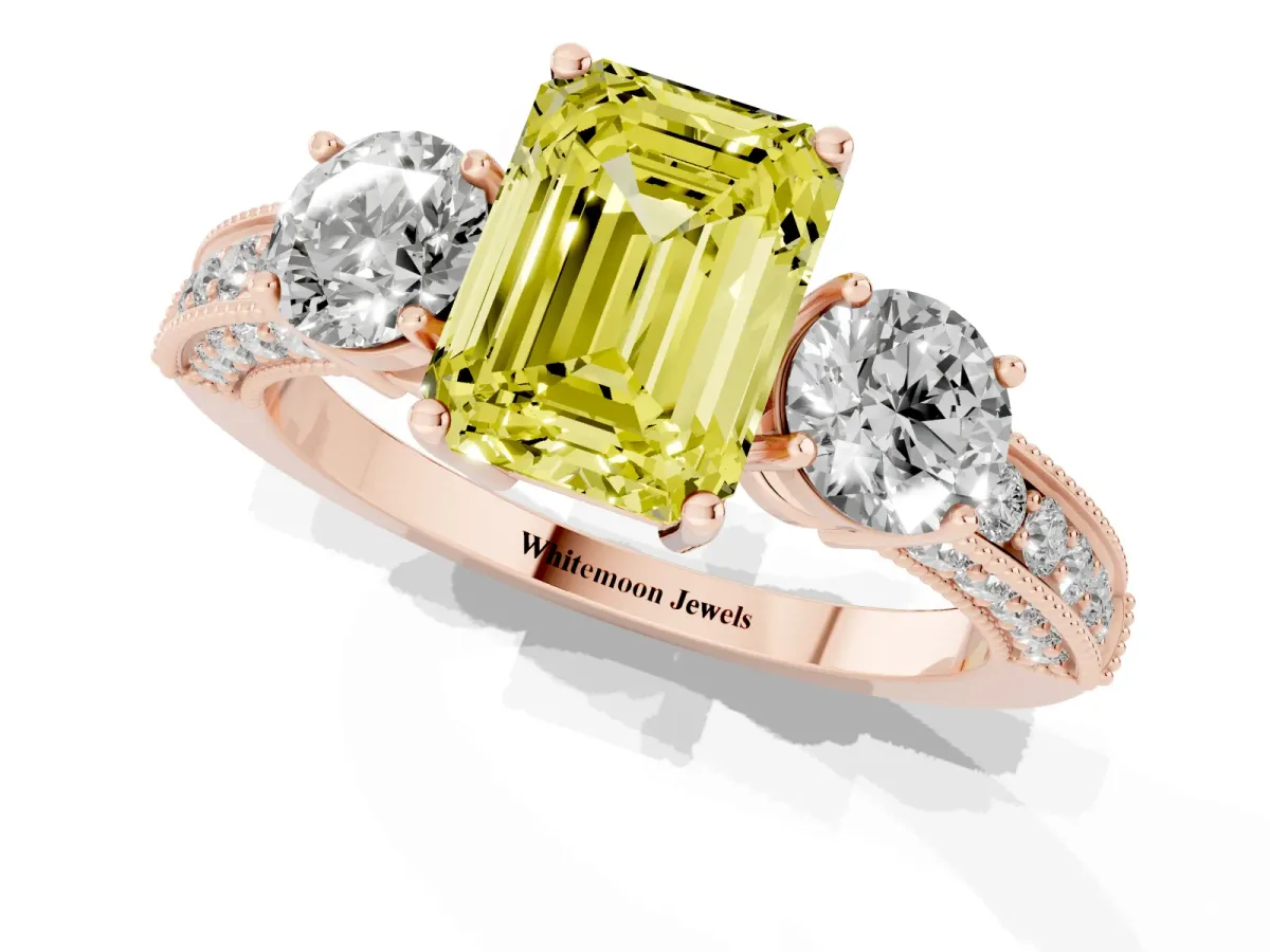 Fancy Yellow Emerald Cut Three-Stone Diamond Ring with Pavé Band and Four-Prong Setting Rose gold
