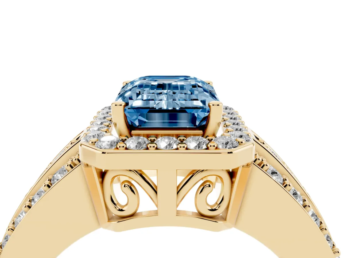Fancy Blue Emerald Cut Halo Diamond Ring with Round Split Shank and Prong Setting Yellow gold