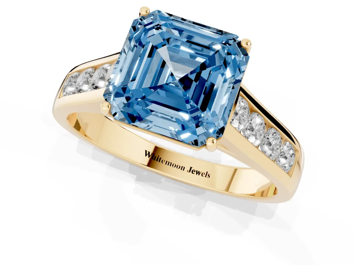 Fancy Blue Asscher Cut Solitaire Channel-Set Diamond Engagement Ring with Four-Prong Setting Yellow gold