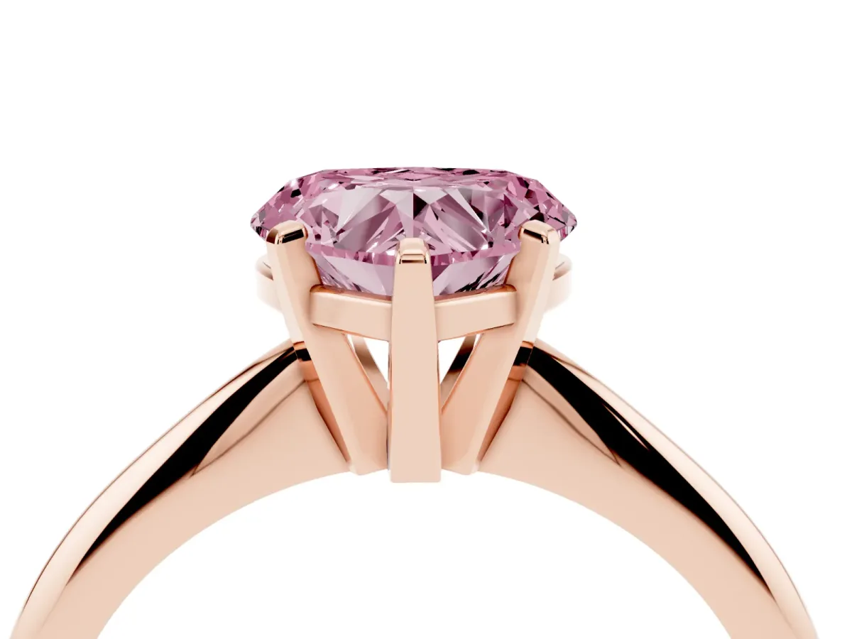 Fancy Pink Heart Cut Cut Solitaire Ring with Four-Prong Setting on a Classic Band Rose gold