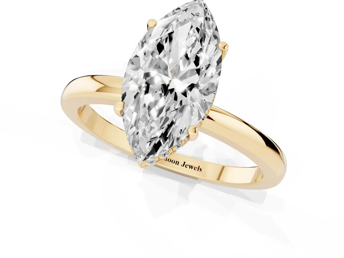 Marquise Cut Solitaire Diamond Ring with Prong Setting and Plain Band Yellow gold