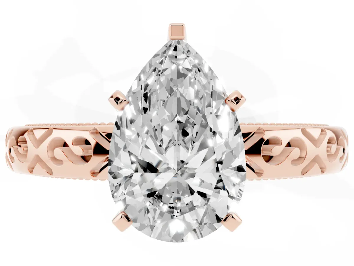 Pear Cut Solitaire Engagement Ring with Scrollwork Band and Four-Prong Setting Rose gold