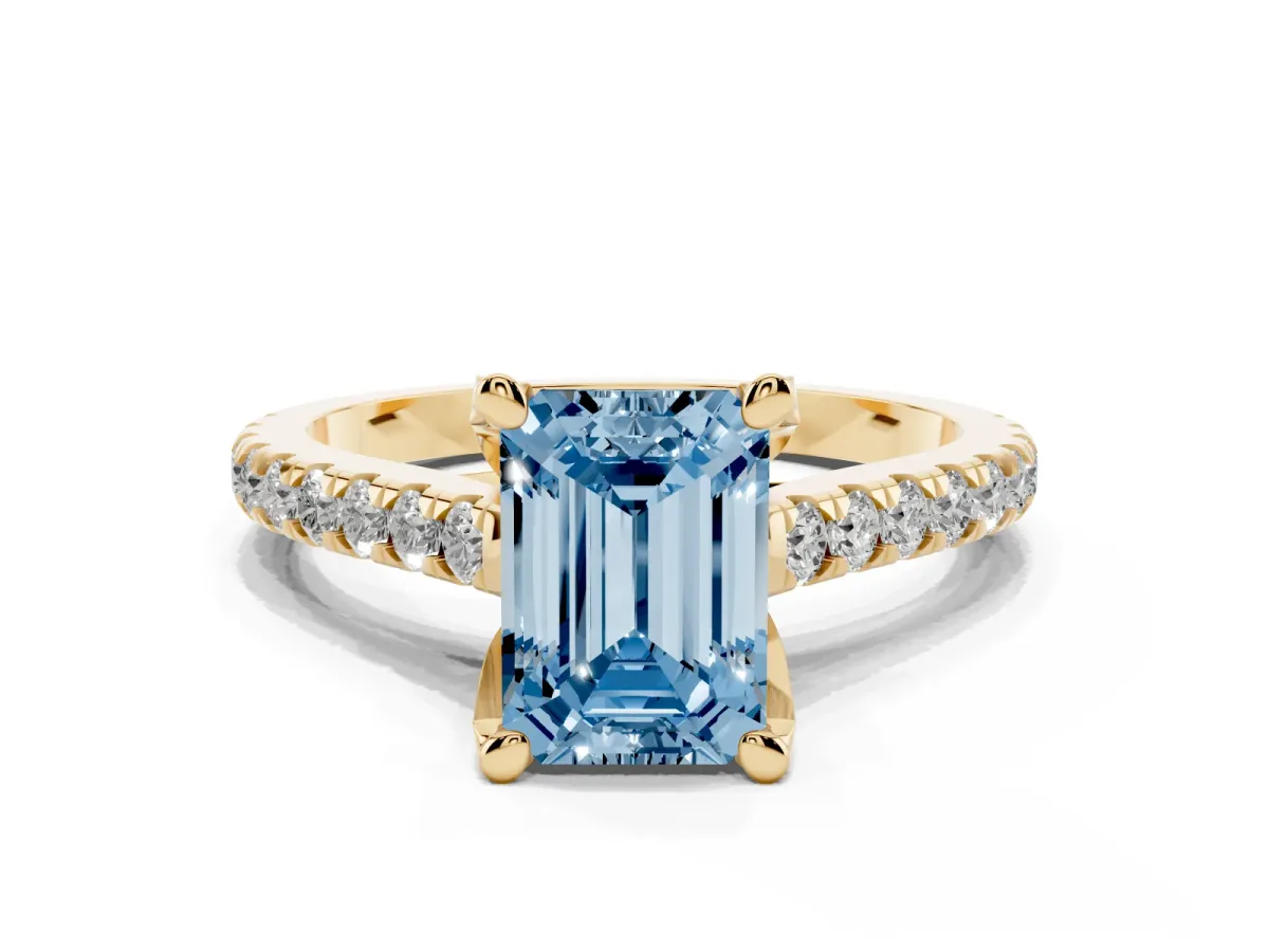 Fancy Blue Emerald Cut Brilliant Diamond Solitaire with Pavé Band and Four-Prong Setting Yellow gold