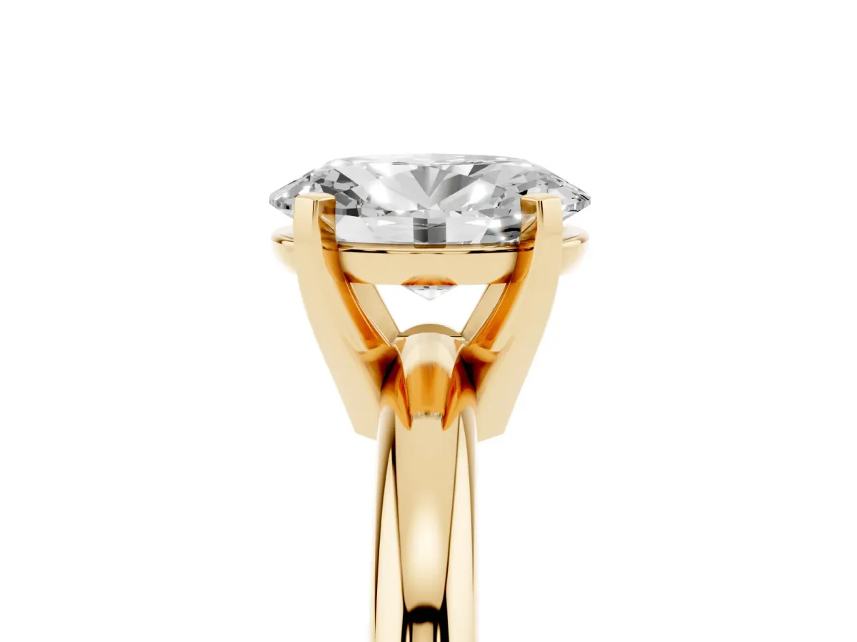 Oval Cut Diamond Solitaire Engagement Ring with Round Band and Four-Prong Setting Yellow gold
