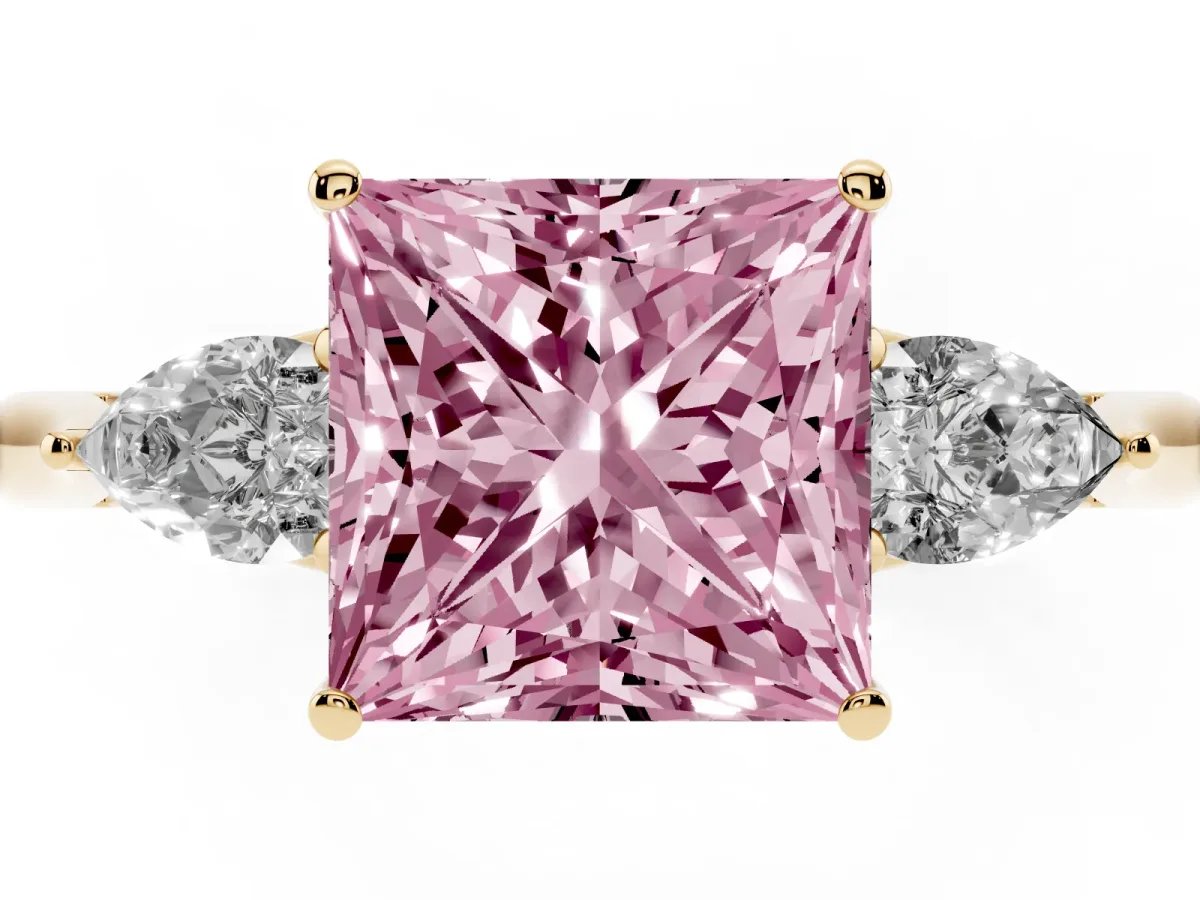 Fancy Pink Princess Cut Diamond Three-Stone Ring with Pear Side Stones and Prong Setting Yellow gold