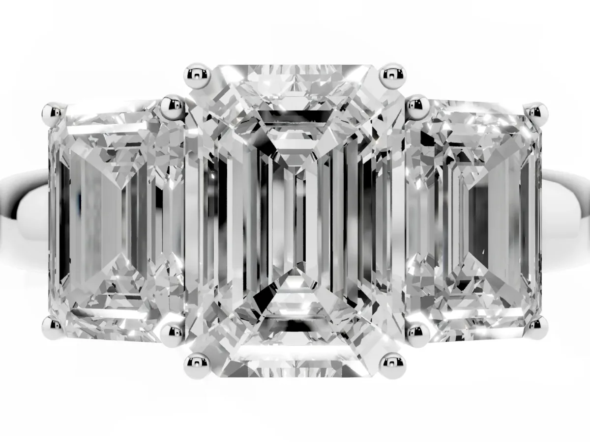 Emerald Cut Diamond Three-Stone Ring with Four-Prong Setting and Classic Band Platinum