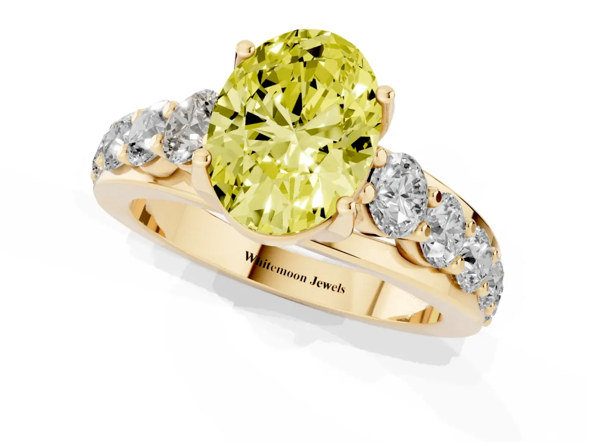 Fancy Yellow Oval Cut Diamond Engagement Ring with Pavé Band and Four-Prong Setting Yellow gold