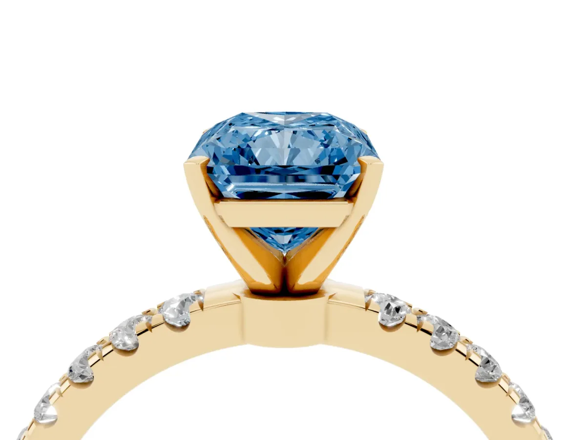 Fancy Blue Radiant Cut Diamond Solitaire Ring with Pavé Accents and Four-Prong Setting Yellow gold