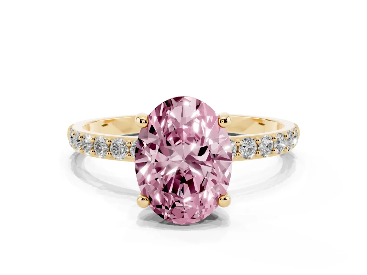 Fancy Pink Oval Cut Diamond Solitaire Ring with Round Pavé Band and Prong Setting Yellow gold