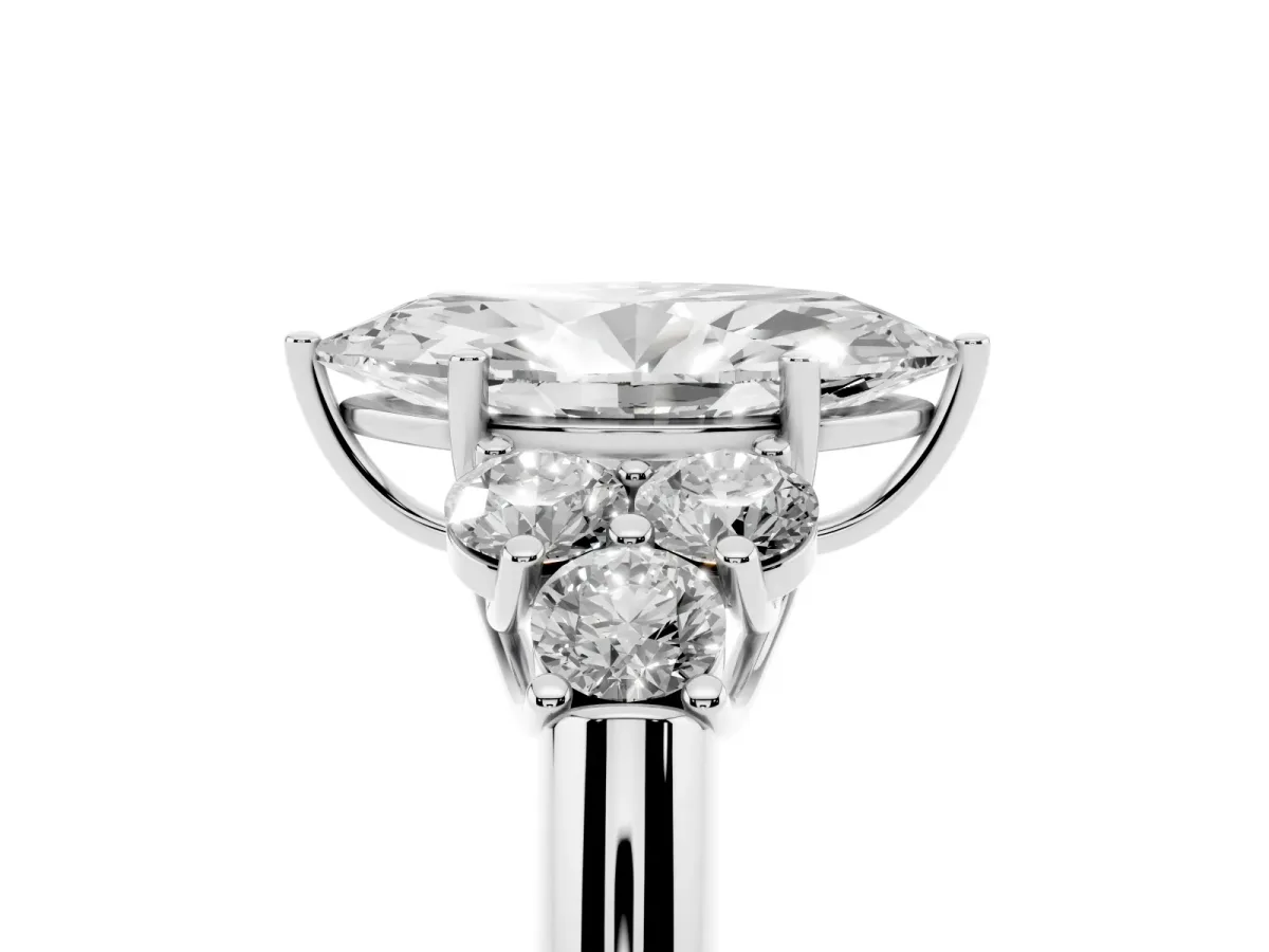Marquise Cut Cut Diamond Cluster Ring with Round Accent Stones and Prong Setting on a Classic Band Silver