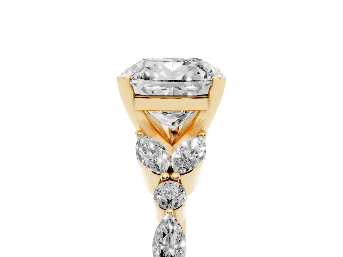 Cushion Cut Diamond Solitaire Ring with Side Stones and Four-Prong Setting Yellow gold