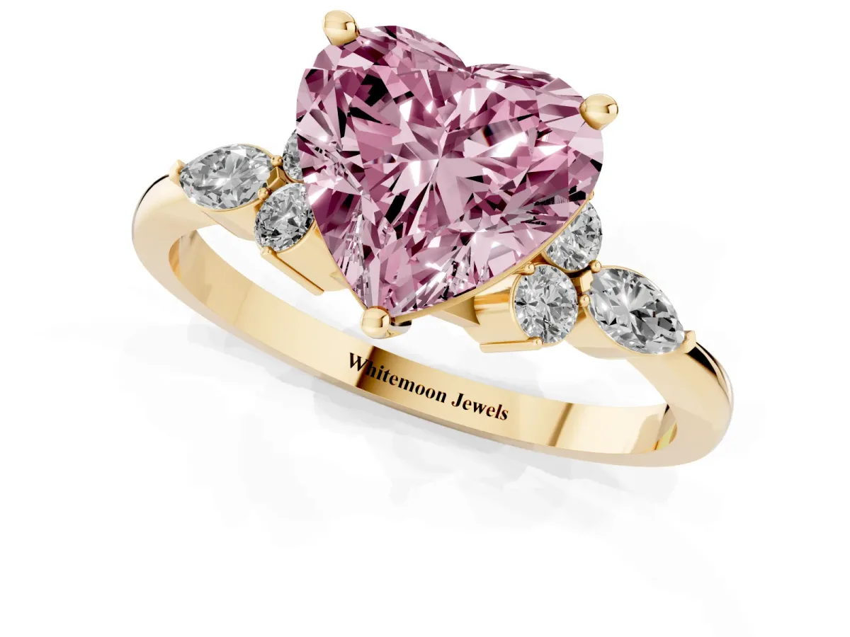 Fancy Pink Heart Cut Brilliant Diamond Solitaire Ring with Pear Side Stones and Four-Prong Setting Yellow gold