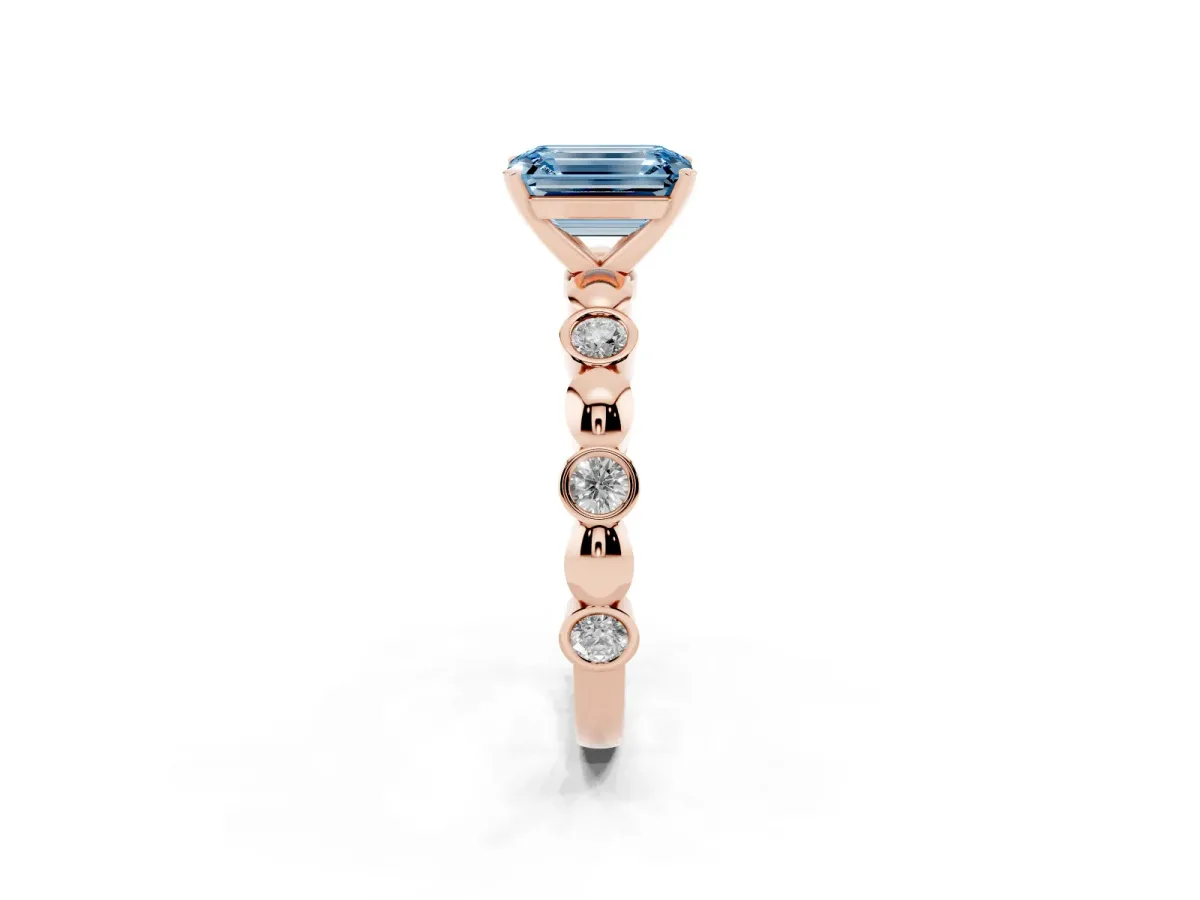 Fancy Blue Emerald Cut Solitaire Bezel-Set Diamond Ring with Beaded Band and Four-Prong Setting Rose gold