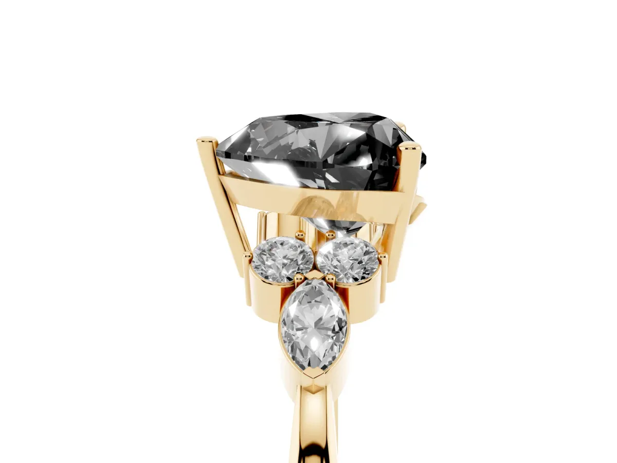 Fancy Black Heart Cut Brilliant Diamond Solitaire Ring with Pear Side Stones and Four-Prong Setting Yellow gold