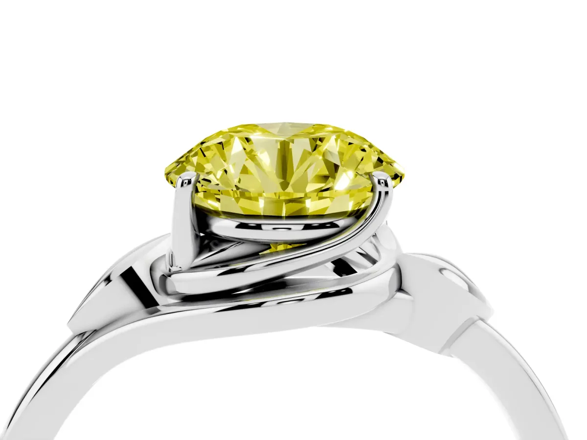 Fancy Yellow Round Cut Diamond Solitaire Ring with Twist Band and Four-Prong Setting Silver
