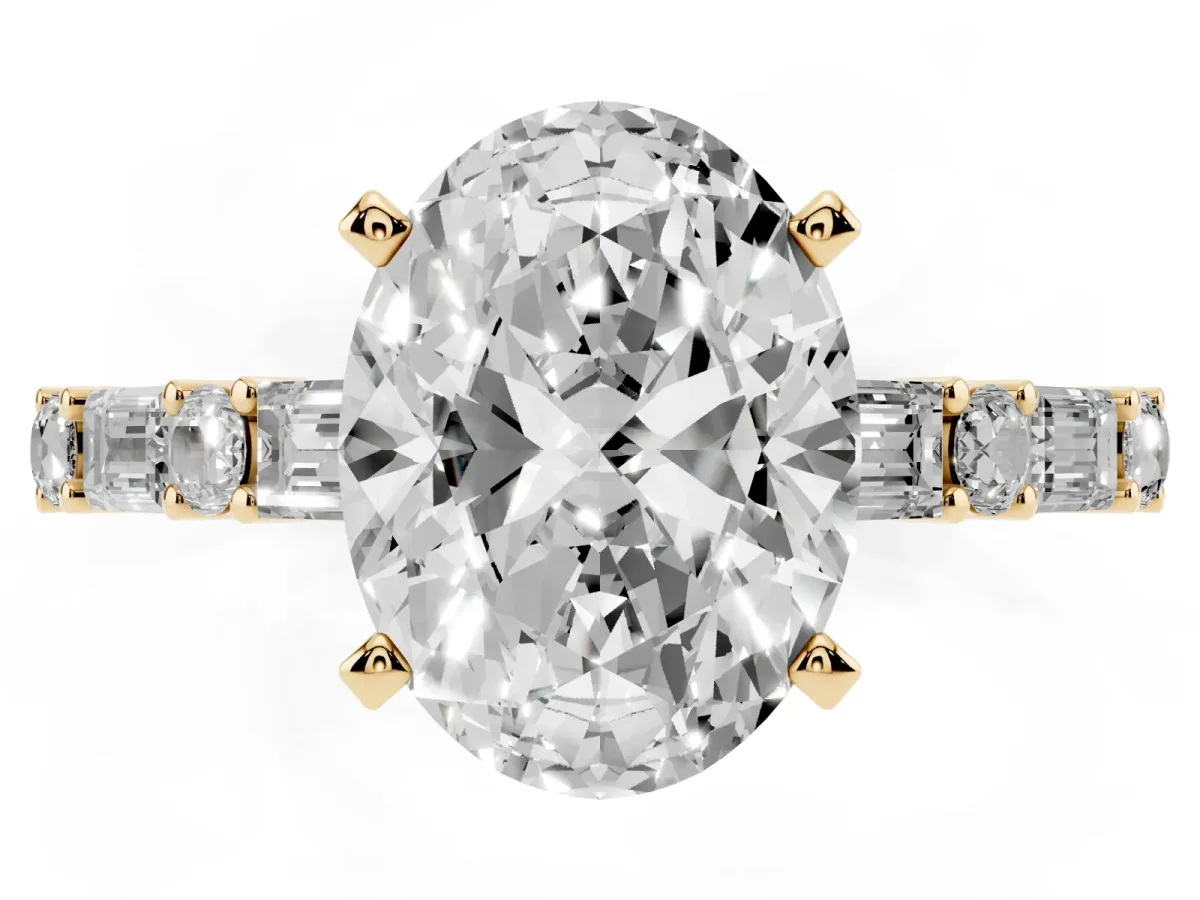 Oval Cut Diamond Solitaire with Side Baguettes and Channel Set Band Yellow gold