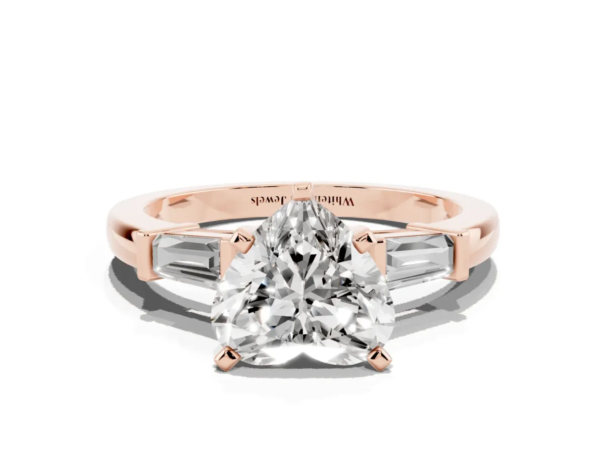 Heart Cut Cut Diamond Solitaire Ring with Tapered Baguette Accents and Four-Prong Setting Rose gold