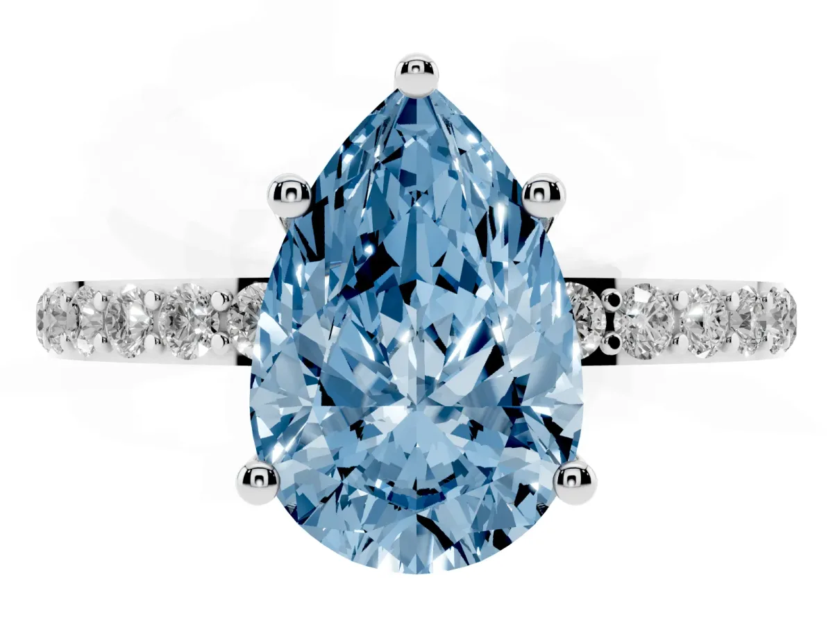 Fancy Blue Pear Cut Diamond Solitaire Ring with Round Pavé Shoulders and Prong Setting Silver