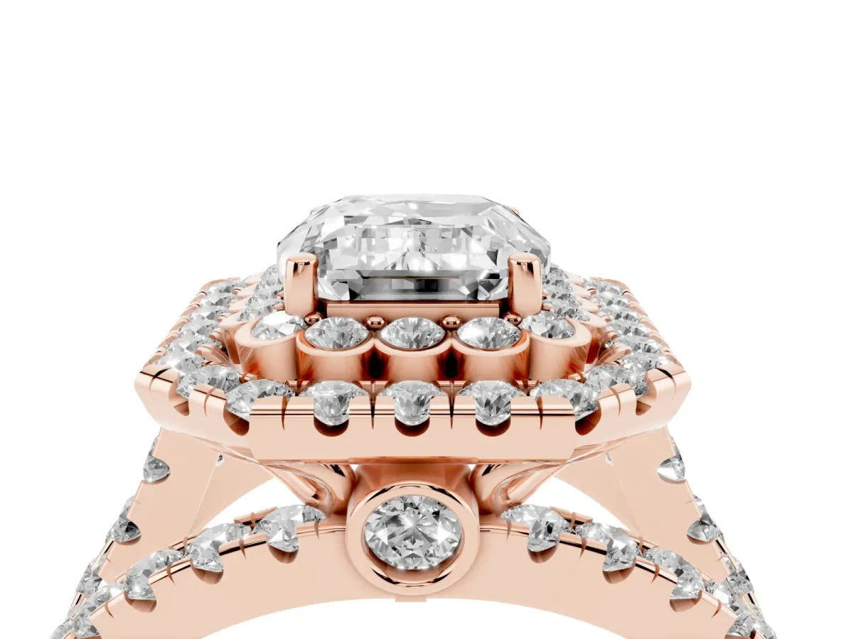 Emerald Cut Diamond Double Halo Ring with Round Pavé Split Shank and Prong Setting Rose gold