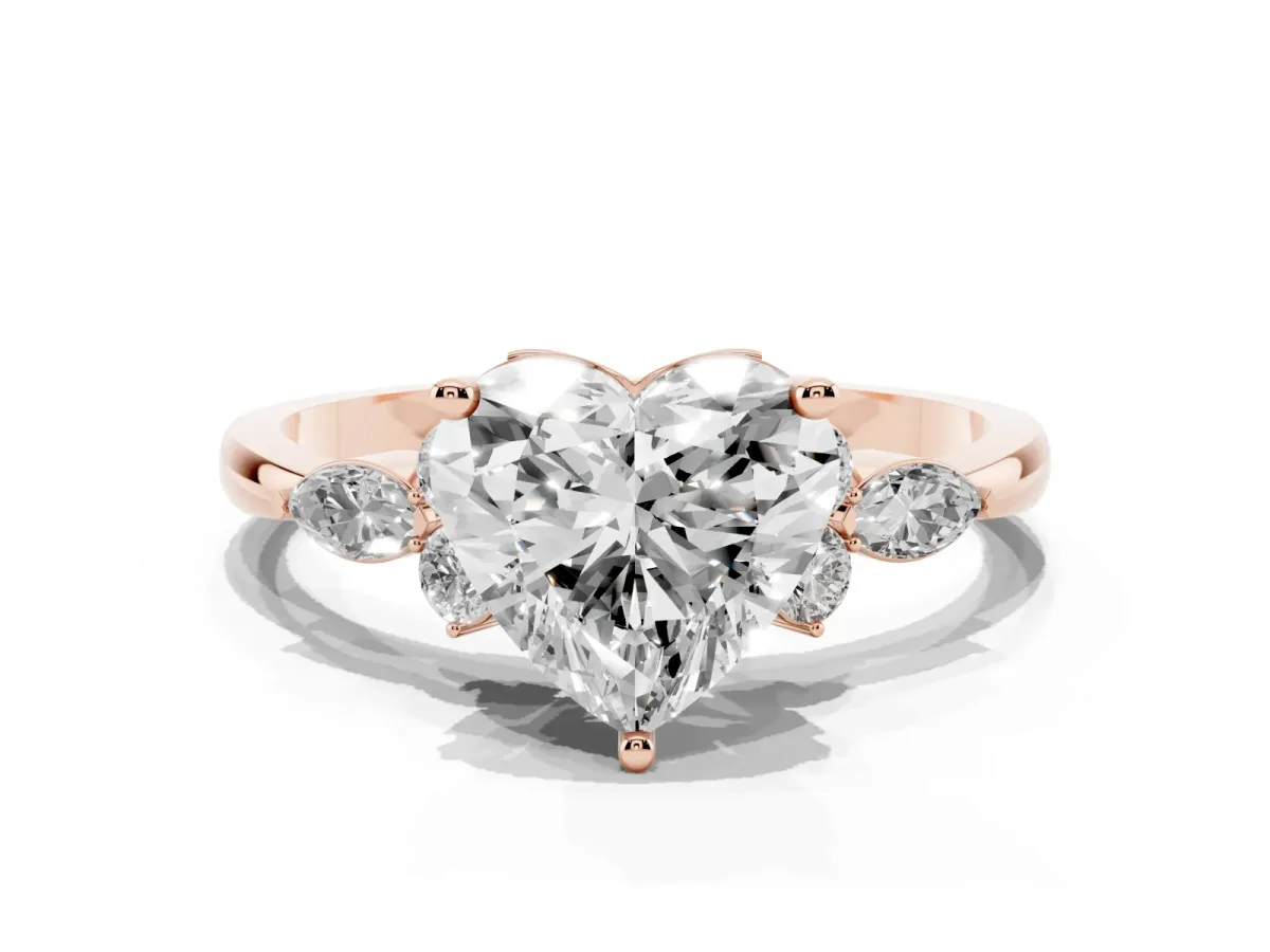 Heart Cut Brilliant Diamond Solitaire Ring with Pear Side Stones and Four-Prong Setting Rose gold