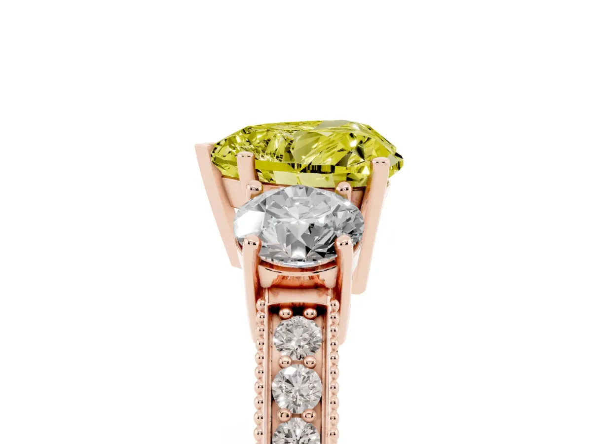 Fancy Yellow Heart Cut Three-Stone Diamond Ring with Pavé Band and Four-Prong Setting Rose gold