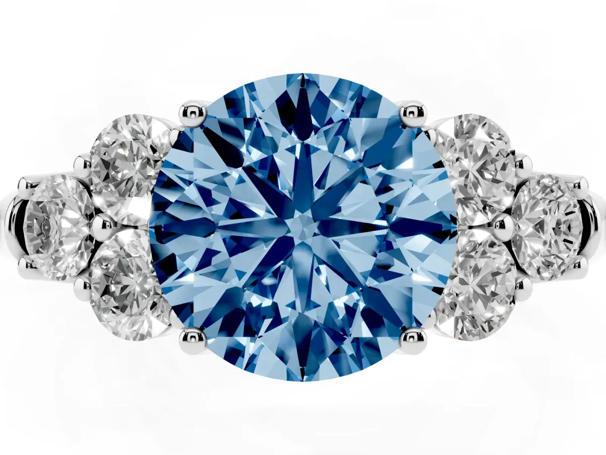 Fancy Blue Round Cut Cut Diamond Cluster Ring with Round Accent Stones and Prong Setting on a Classic Band Silver