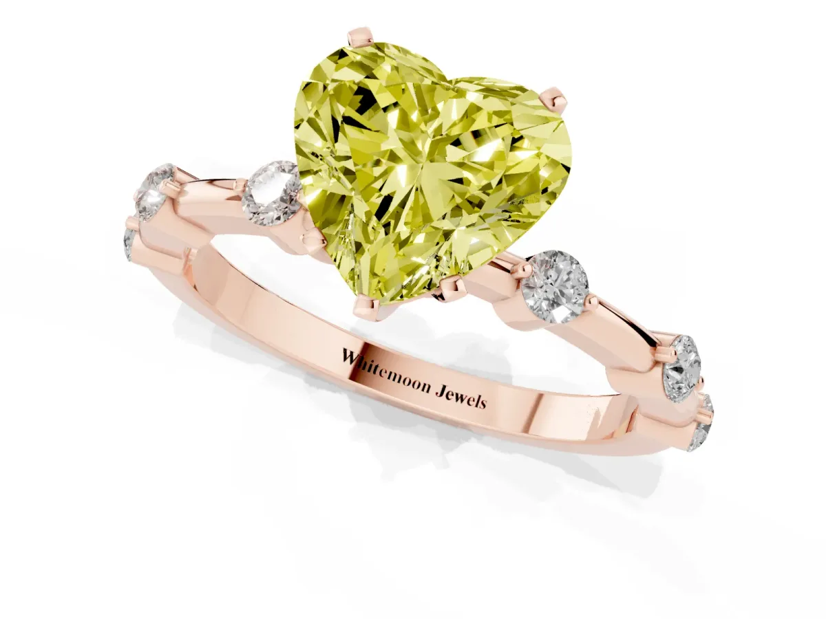 Fancy Yellow Heart Cut Solitaire Diamond Ring with Bezel Set Side Stones and Prong Setting Rose gold