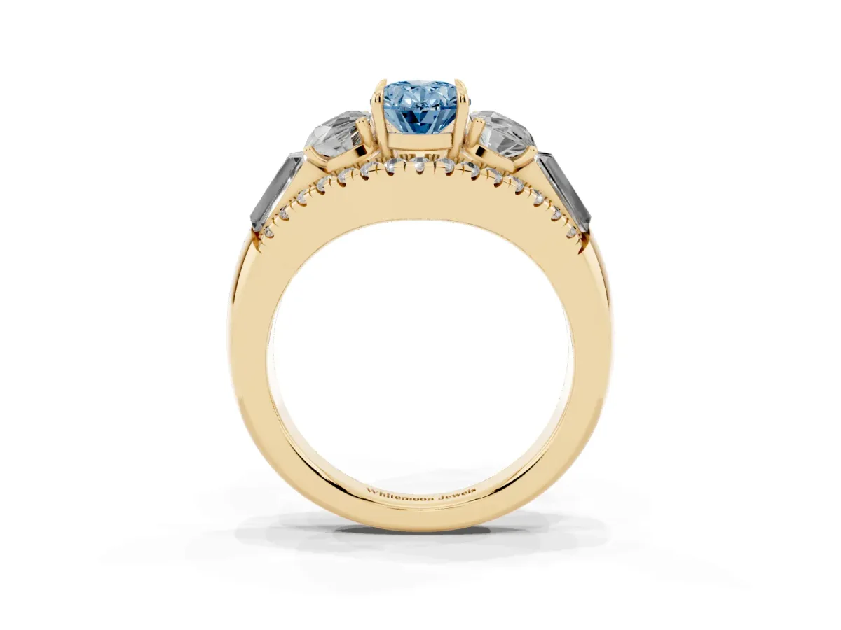 Fancy Blue Three-Stone Oval Cut Diamond Engagement Ring with Pave Band and Prong Setting Yellow gold